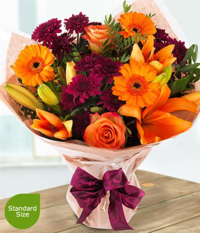 Autumn Sun - Gerberra Lily and chrysanth stylishly arranged with foliage and filler